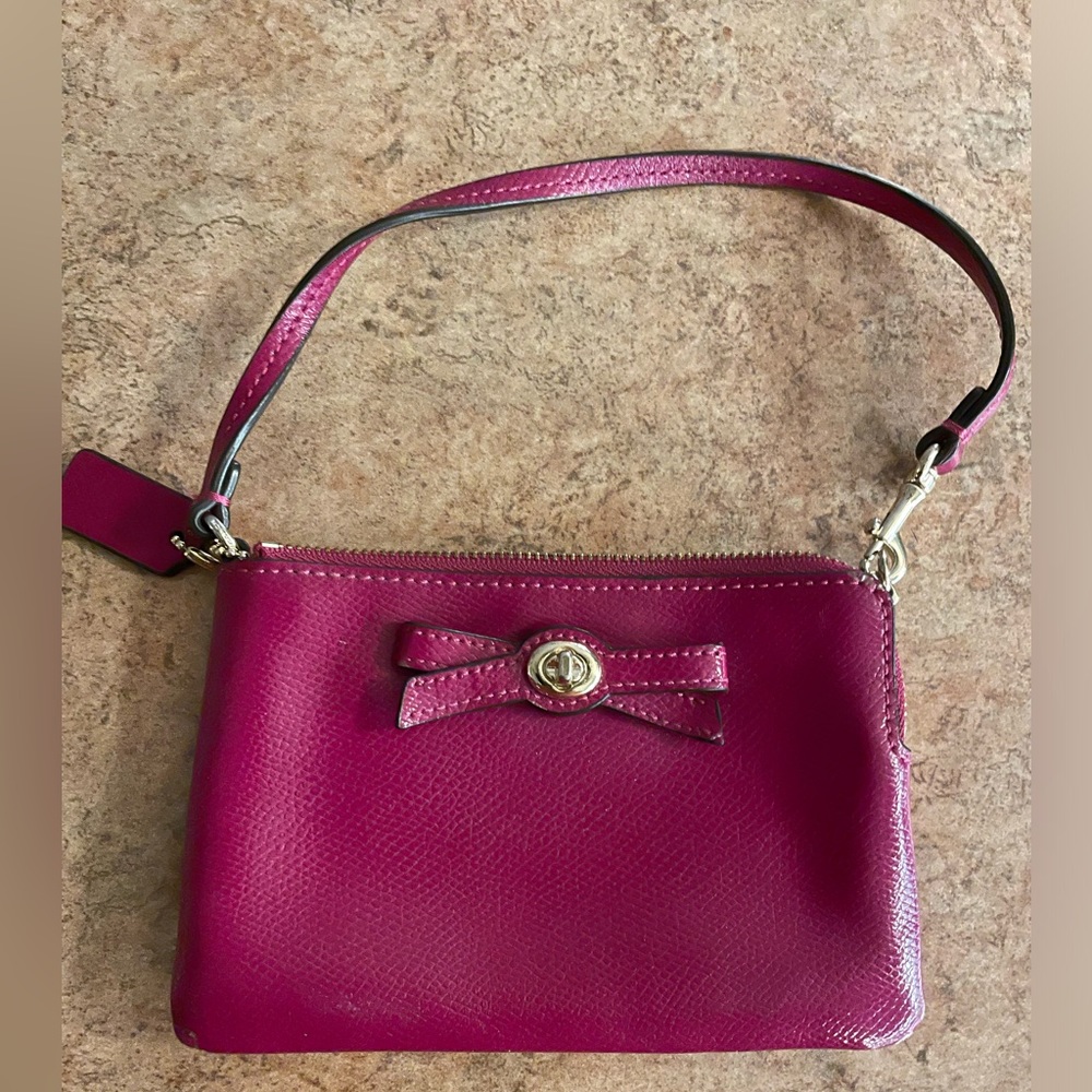 Cute little coach wallet with bow in front